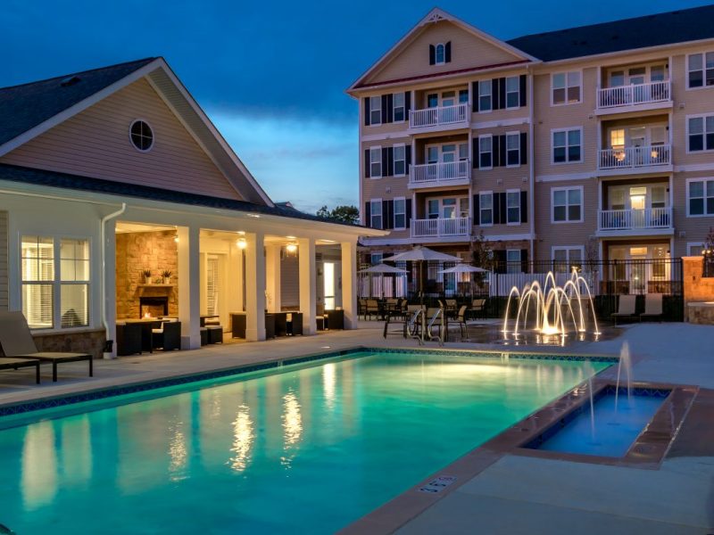This image shows a refreshing swimming pool and splash pad.